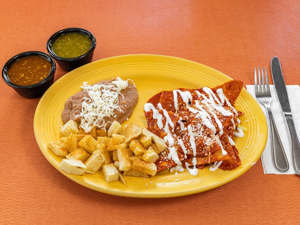 Colorful dishes served in a casual dining room.